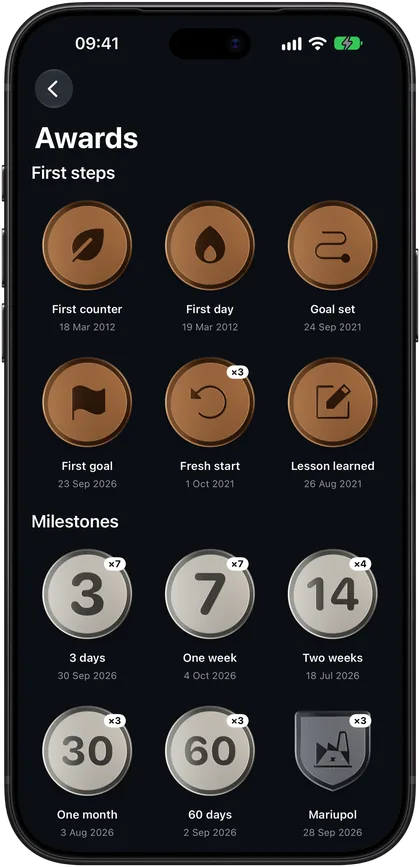Awards on iPhone: coins for years and badges for goals and records