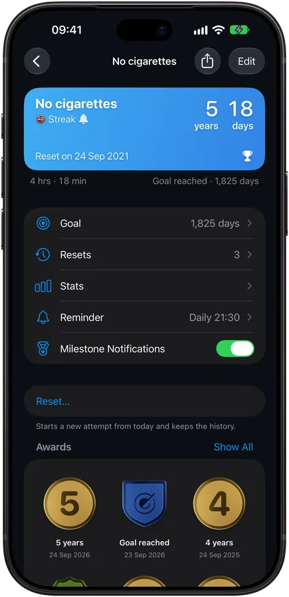 A streak counter on iPhone with its goal, resets, stats, reminder and awards